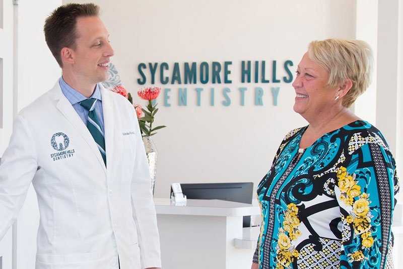 dr rorick with dental patient considerate dentistry