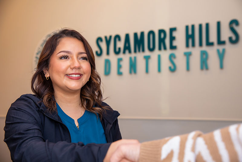 team member shaking Patient's hand