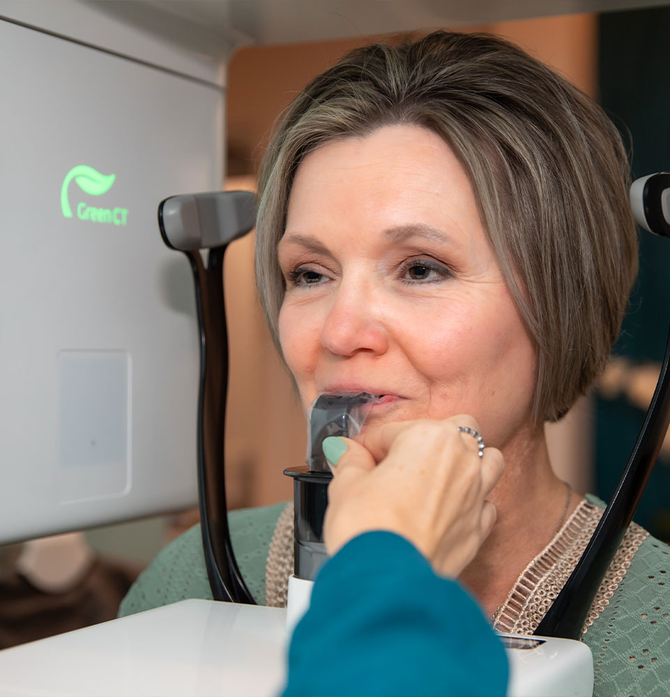 Patient taking a dental x-ray