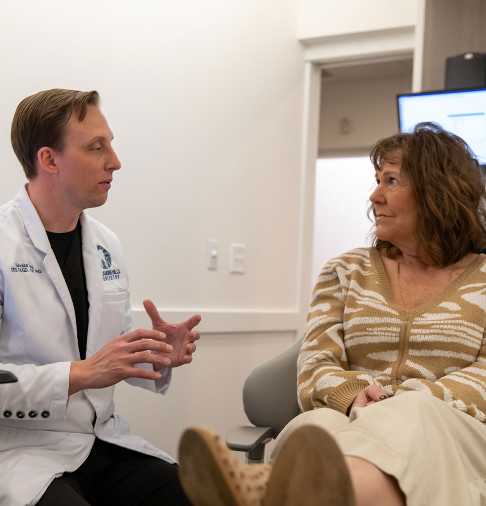 Dentist going over sedation options with patient